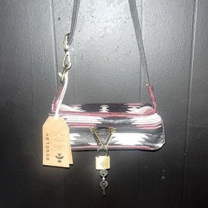 Revelry smell proof and water resistance cross body bag